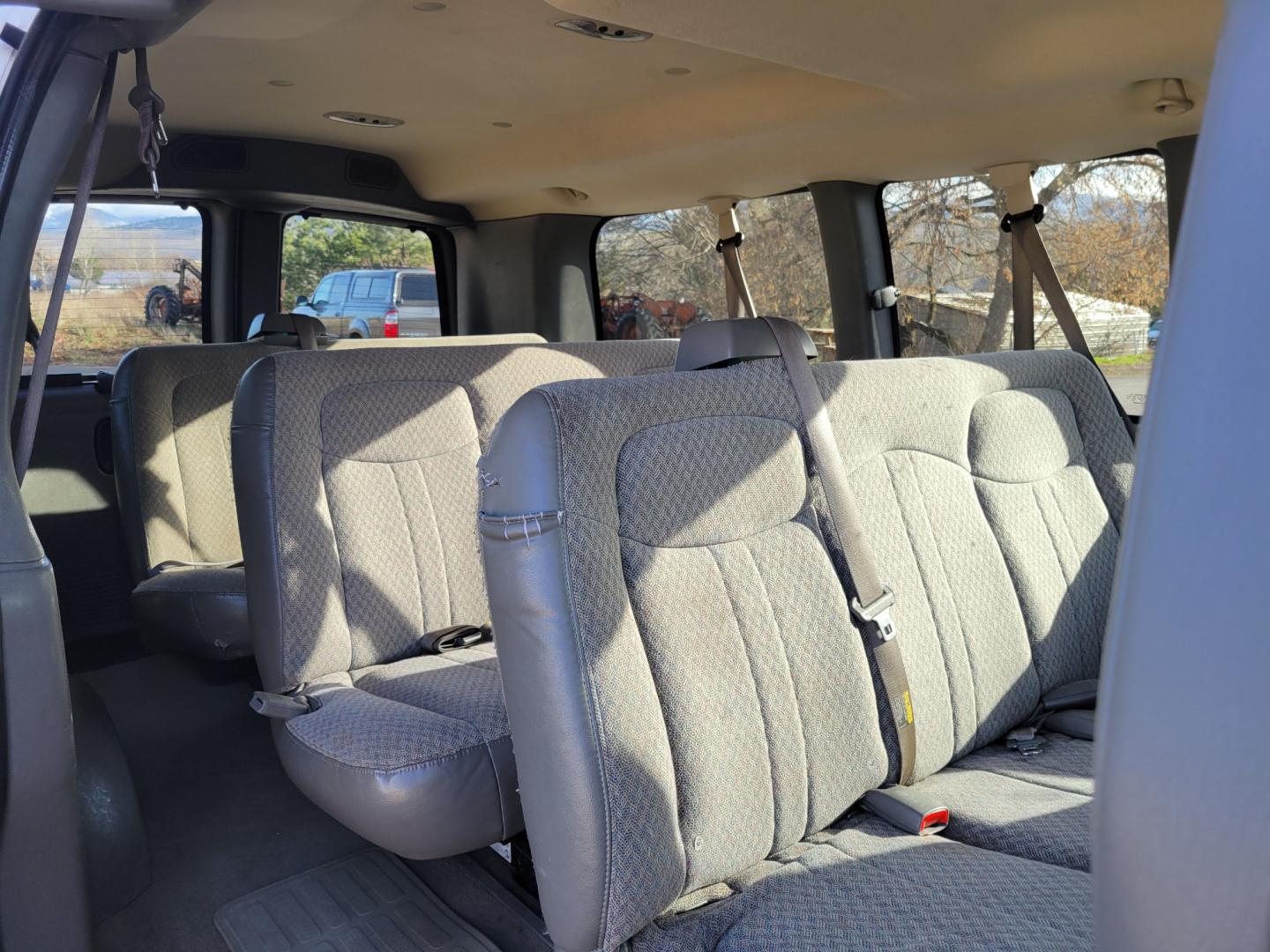 2007 White /Tan Chevrolet Express Express (1GNFH15Z471) with an 5.3L V8 engine, 4 Speed Auto transmission, located at 450 N Russell, Missoula, MT, 59801, (406) 543-6600, 46.874496, -114.017433 - Runs well. Shifts great. AWD works Perfectly. But... Has a few dash lights on. (ABS, Check Engine and Airbag) Seats 11. 5.3L V8. 4 Speed Automatic Transmission. Front and Rear Climate Control. AM FM CD Player. Power Windows and Locks. Because of the Miles, Financing is NOT Available. - Photo#8